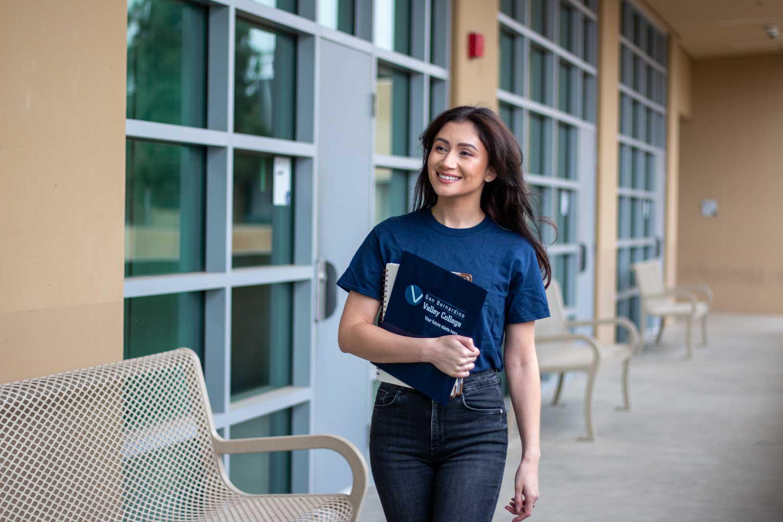 Students walks with SBVC folder